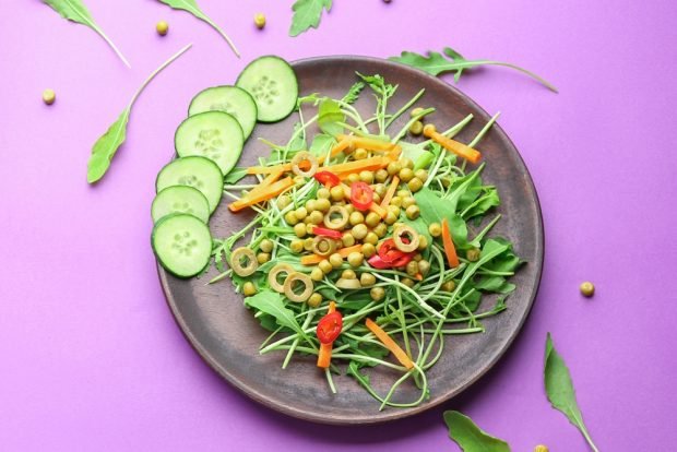 Arugula salad and green peas Arugula salad and green peas