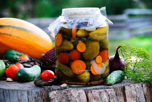 Assorted cucumbers and tomatoes for the winter