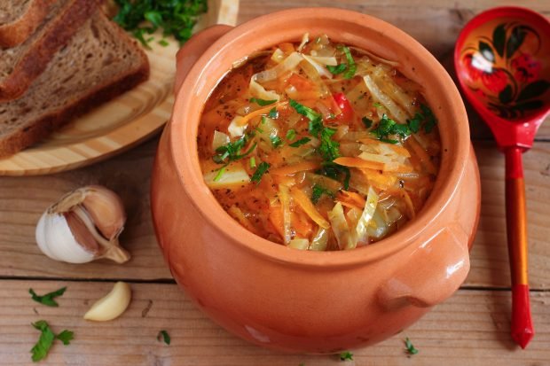 Cabbage soup, tomatoes and pepper for the winter in banks Cabbage soup, tomatoes and pepper for the winter in banks