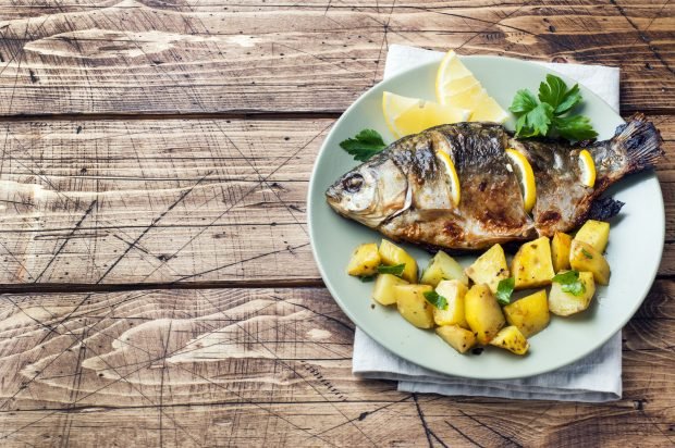 Carp with potatoes in the oven Carp with potatoes in the oven