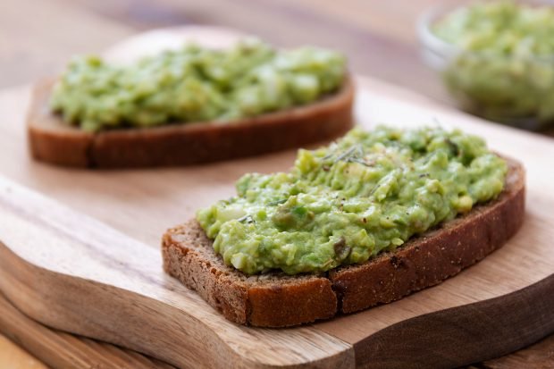 Classic guacamole with avocado and tomatoes Classic guacamole with avocado and tomatoes
