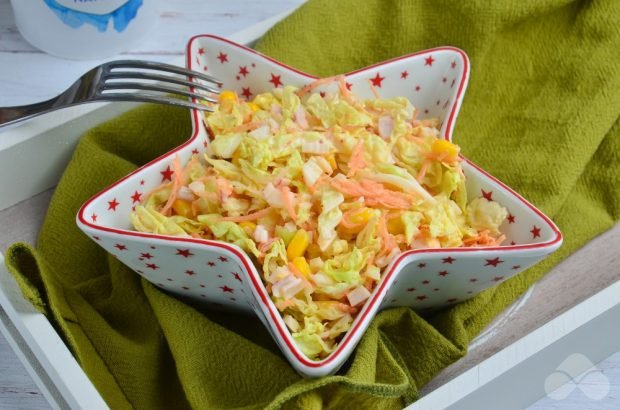 Dietary cabbage salad with carrots and crab sticks Dietary cabbage salad with carrots and crab sticks