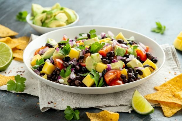 Exotic salad with red beans, mangoes, avocados and tomatoes Exotic salad with red beans, mangoes, avocados and tomatoes