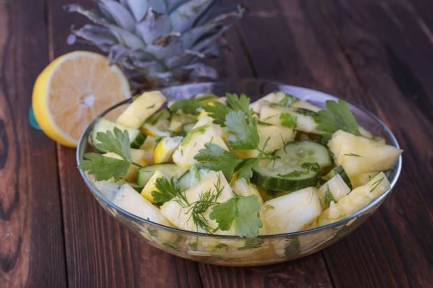 Fresh salad with pineapple, cucumbers and apple Fresh salad with pineapple, cucumbers and apple