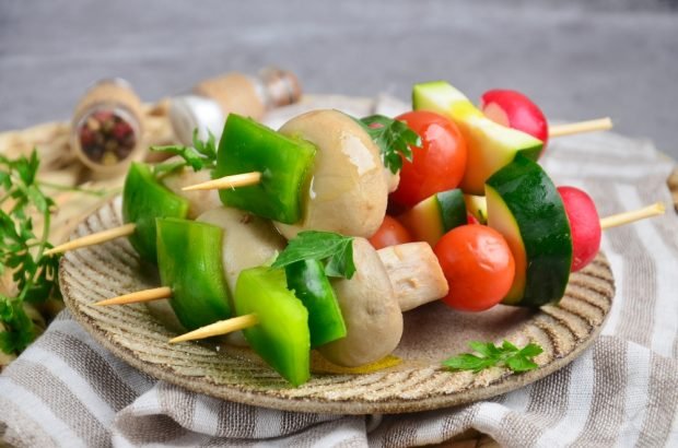 Fresh vegetables with mushrooms on skewers Fresh vegetables with mushrooms on skewers