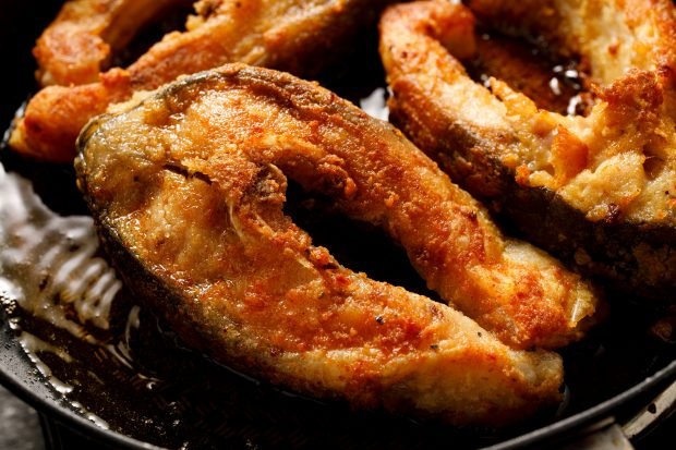 Fried carp in a pan