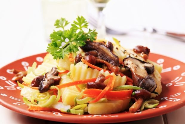 German salad with mushrooms and potatoes
