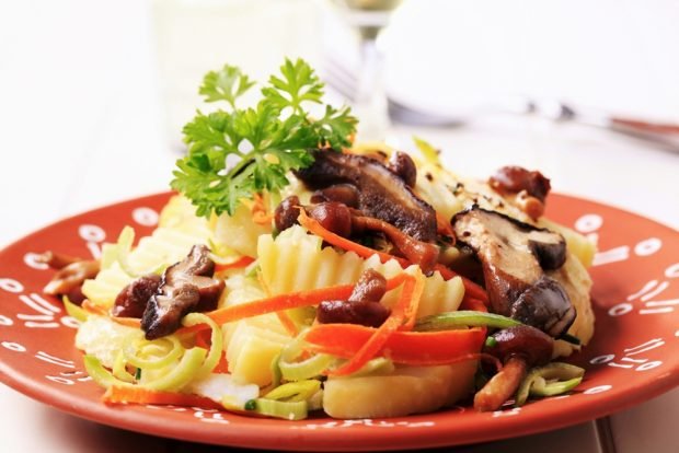 German salad with mushrooms and potatoes German salad with mushrooms and potatoes