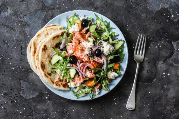 Greek salad with baked red fish Greek salad with baked red fish