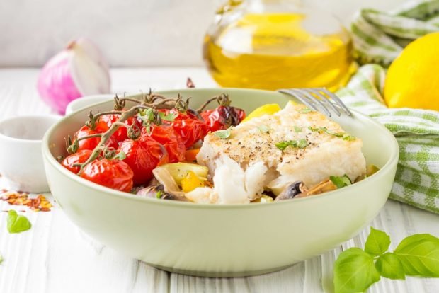 Hek with vegetables and mushrooms in the oven Hek with vegetables and mushrooms in the oven