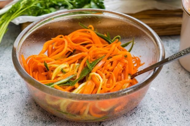 Juicy carrots in Korean with cucumbers and soy sauce Juicy carrots in Korean with cucumbers and soy sauce