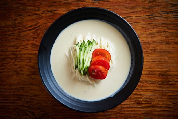 Korean soup with noodles and soy milk Korean soup with noodles and soy milk