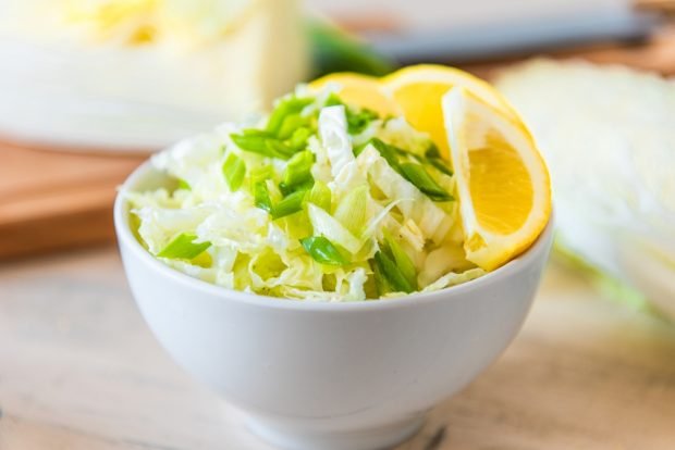 Peking cabbage salad, green onions and lemon Peking cabbage salad, green onions and lemon