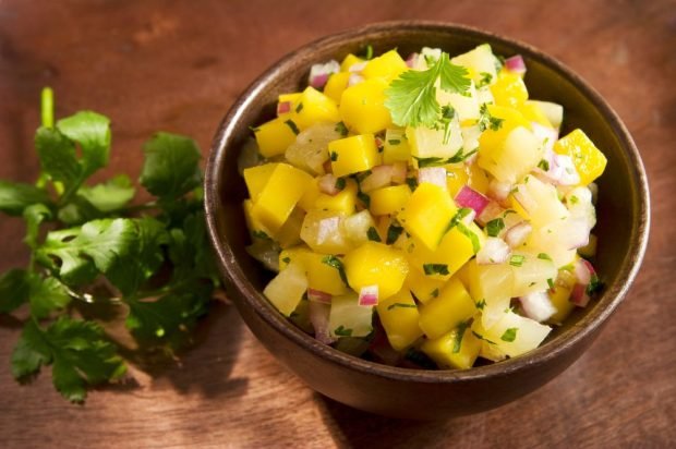 Pineapple salad, mangoe and purple onion Pineapple salad, mangoe and purple onion