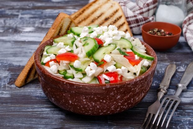 Salad with cucumbers, pepper and cottage cheese