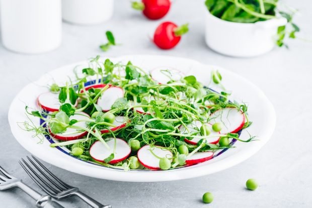 Salad with radishes, green peas and sprouts Salad with radishes, green peas and sprouts
