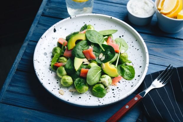 Salad with red fish, avocado and Brussels cabbage Salad with red fish, avocado and Brussels cabbage