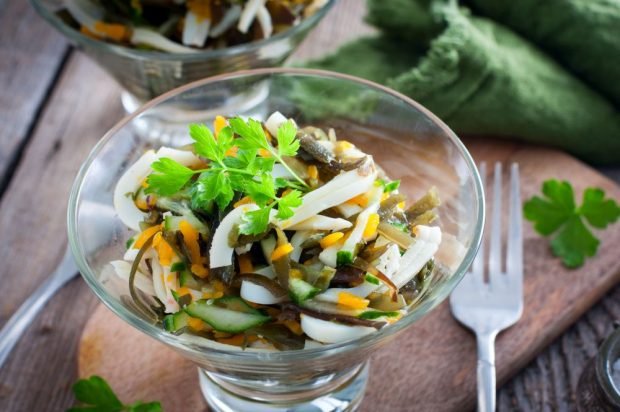 Salad with squid, sea cabbage, carrots and cucumbers Salad with squid, sea cabbage, carrots and cucumbers