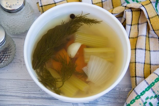 Vegetable broth with carrots and herbs Vegetable broth with carrots and herbs