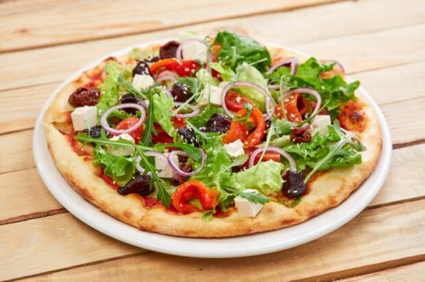 Vegetarian pizza with Shiitaka, dried tomatoes and tofu Vegetarian pizza with Shiitaka, dried tomatoes and tofu